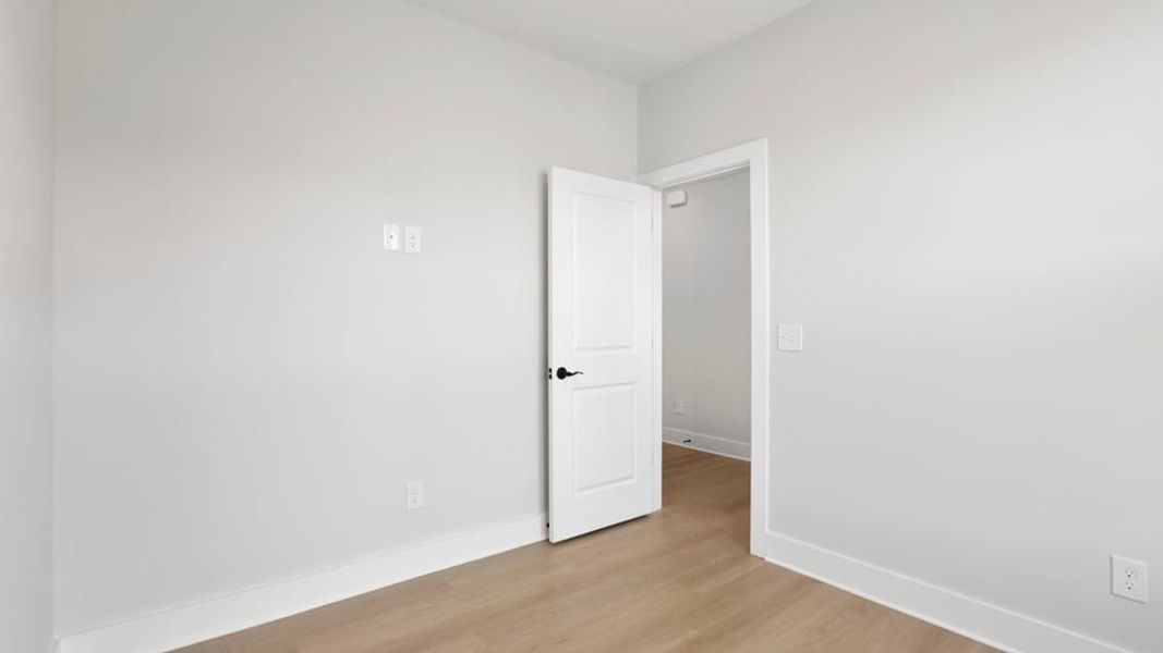 Representative unfurnished interior of a home built from the Bakersfield by D.R. Horton in Edgewood Estates, Greenville (Image 17).
