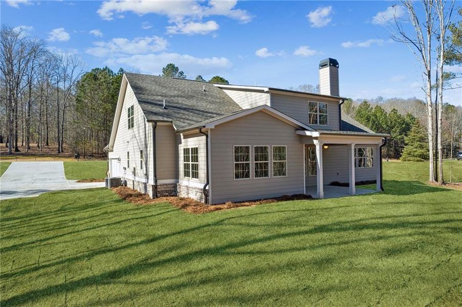 Front exterior of a new home in , Monroe, GA, highlighting curb appeal (Image 22). Front exterior of a new home in , Monroe, GA, highlighting curb appeal (Image 22).