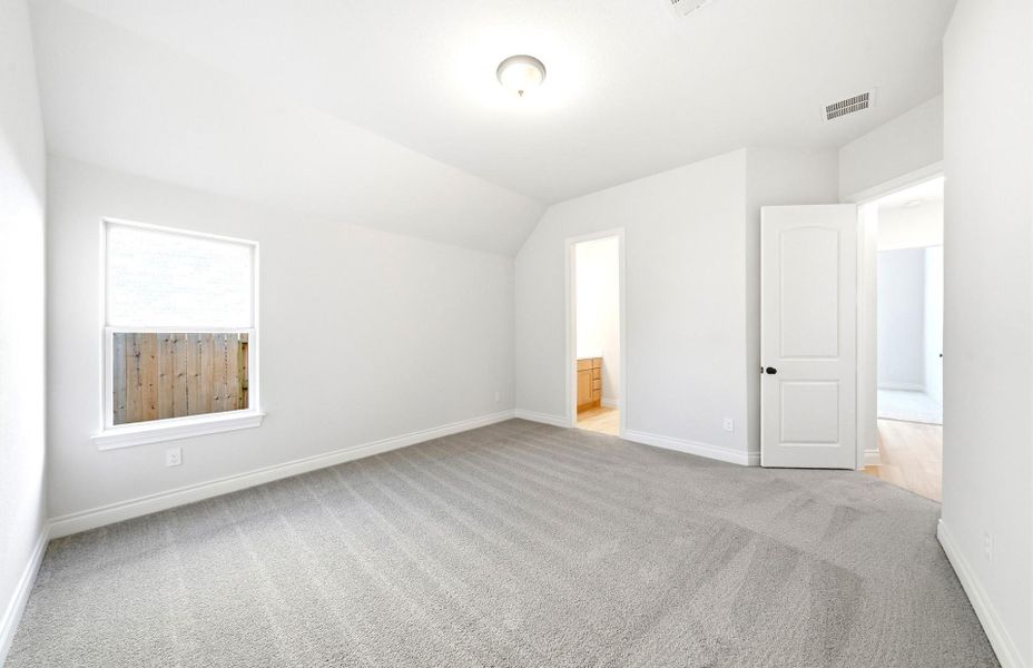 Spacious, unfurnished interior of a new home in Artavia 70′, Conroe (Image 55).