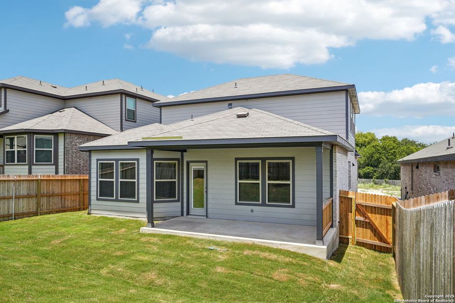 Front exterior of a new home in Comanche Ridge, San Antonio, TX, highlighting curb appeal (Image 24). Front exterior of a new home in Comanche Ridge, San Antonio, TX, highlighting curb appeal (Image 24).