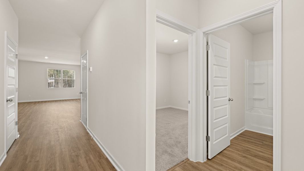 Representative unfurnished interior of a home built from the Kerry by D.R. Horton in Champion's Run, Lithonia (Image 13).