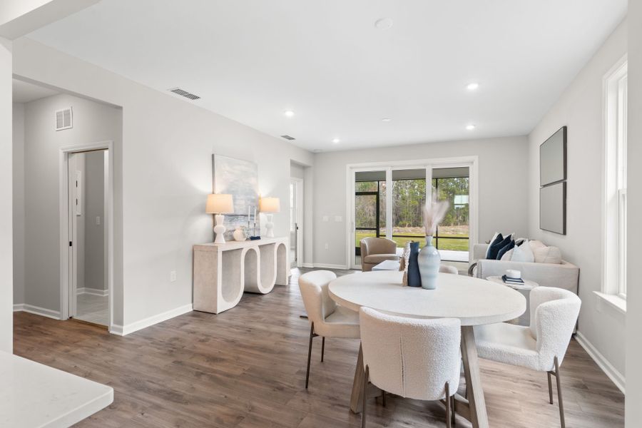 Kitchen view of Dining Area & Gathering Space in Model Home