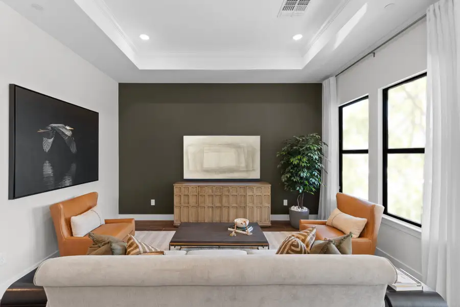 Great room with coffered ceiling and gorgeous tile Great room with coffered ceiling and gorgeous tile