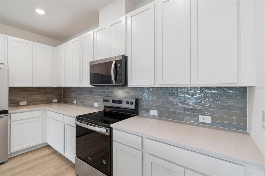 Furnished interior view inside a new home in Waterset Townhomes, Apollo Beach (Image 10).