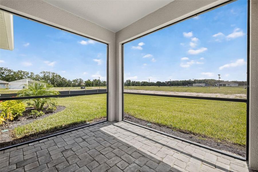 Exterior details and patio area of a home in Windwater, Parrish (Image 2).