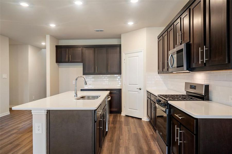 Loads of counter space with a corner pantry