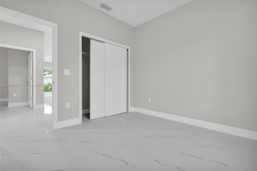 Spacious, unfurnished interior of a new home in , Lehigh Acres (Image 15).
