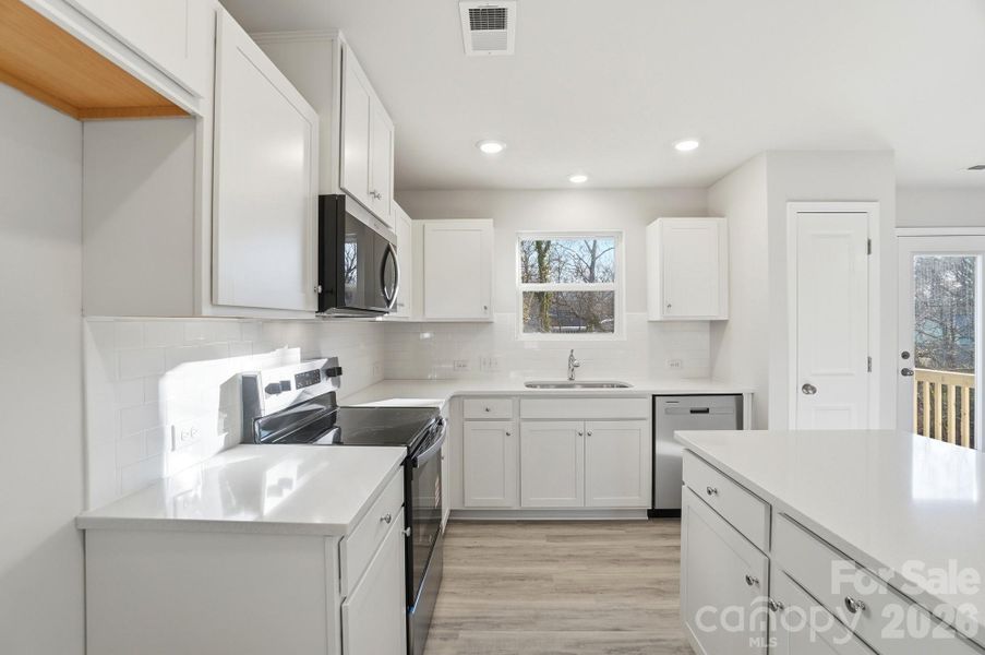Furnished interior view inside a new home in , Statesville (Image 6).