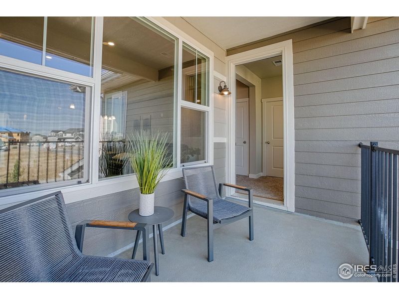 Exterior details and patio area of a home in The Lakes at Centerra - Discovery, Loveland (Image 4).