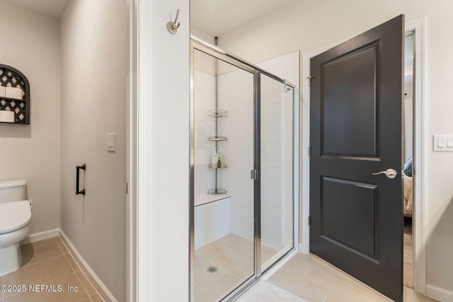 Furnished interior view inside a new home in Seminole Palms Single-Family Homes, Palm Coast (Image 36).