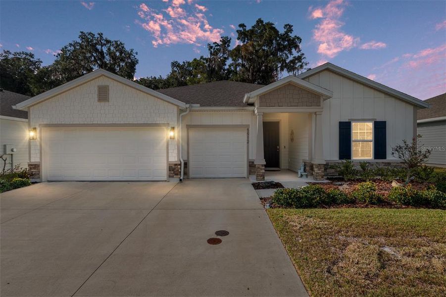 Front exterior of a new home in Finley Woods, Gainesville, FL, highlighting curb appeal (Image 1). Front exterior of a new home in Finley Woods, Gainesville, FL, highlighting curb appeal (Image 1).