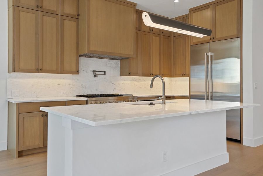 Furnished interior view inside a new home in Milky Way at River Place, Austin (Image 5).