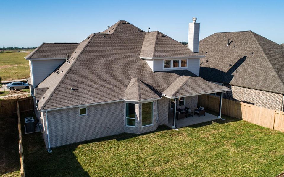 Exterior details and patio area of a home in High Park Hill, Arrington (Image 4).