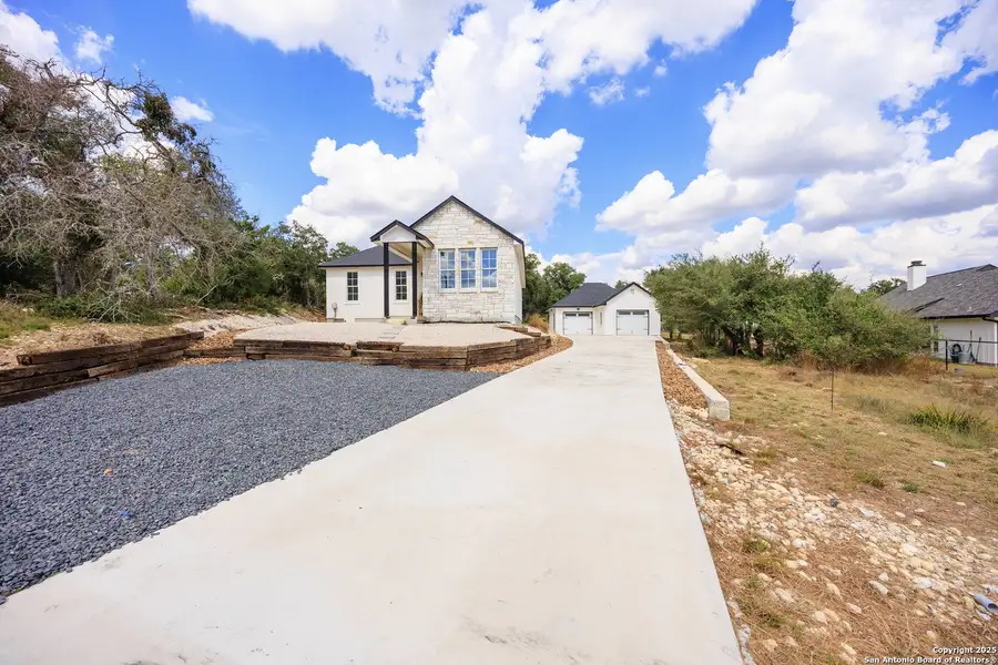 Front exterior of a new home in , Blanco, TX, highlighting curb appeal (Image 1). Front exterior of a new home in , Blanco, TX, highlighting curb appeal (Image 1).