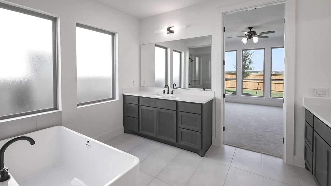 Furnished interior view inside a new home in Crosswinds, Kyle (Image 9).