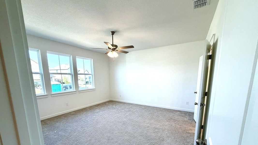 Furnished interior view inside a new home in Flora, Hutto (Image 7).