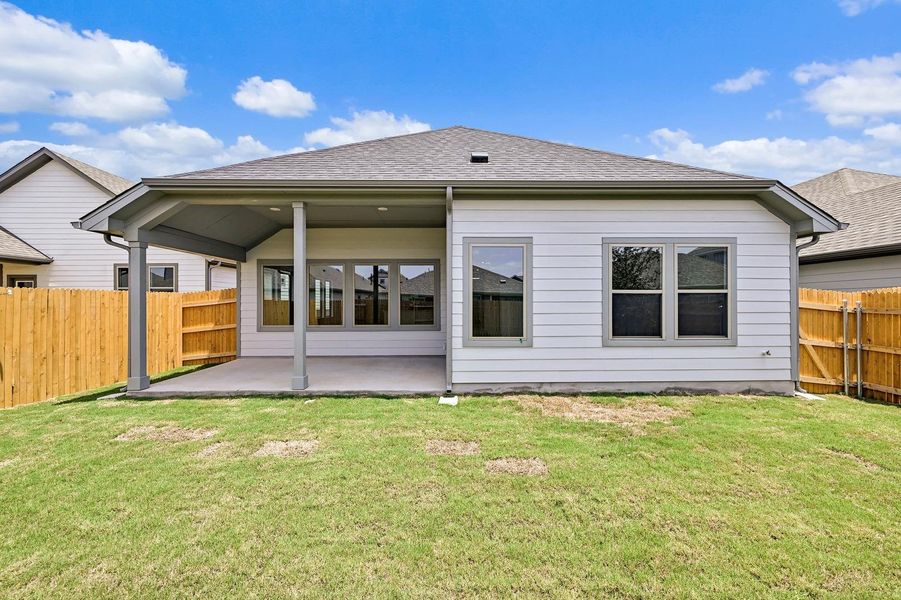 Exterior details and patio area of a home in Prairie Winds, Hutto (Image 22).