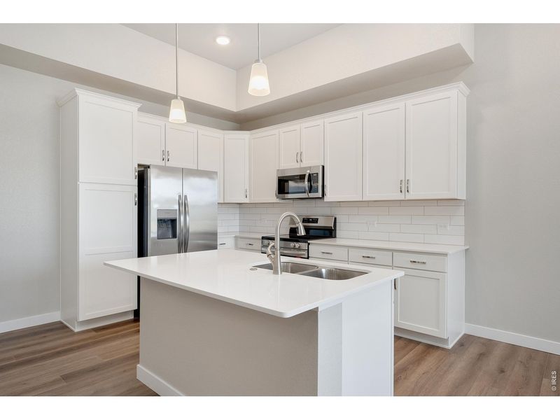 Furnished interior view inside a new home in The Lakes at Centerra - Discovery, Loveland (Image 7).