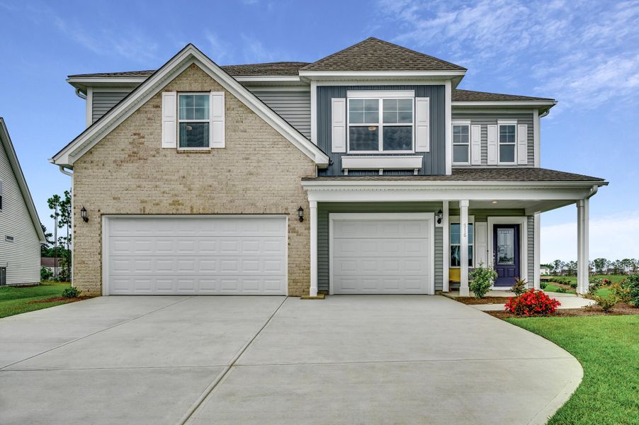 Front exterior of a new home in Hewing Farms, Summerville, SC, highlighting curb appeal (Image 1). Front exterior of a new home in Hewing Farms, Summerville, SC, highlighting curb appeal (Image 1).