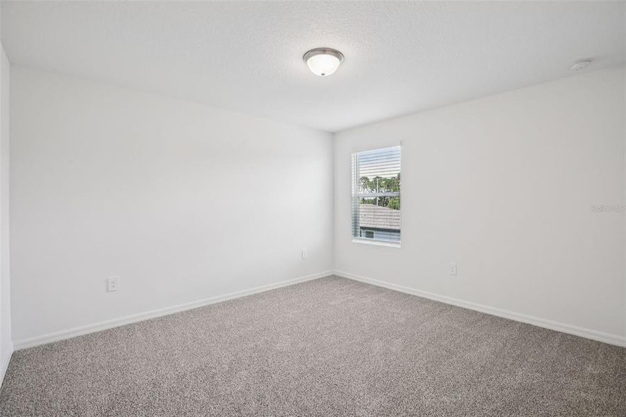 Spacious, unfurnished interior of a new home in Villamar - Classic Series, Winter Haven (Image 30).