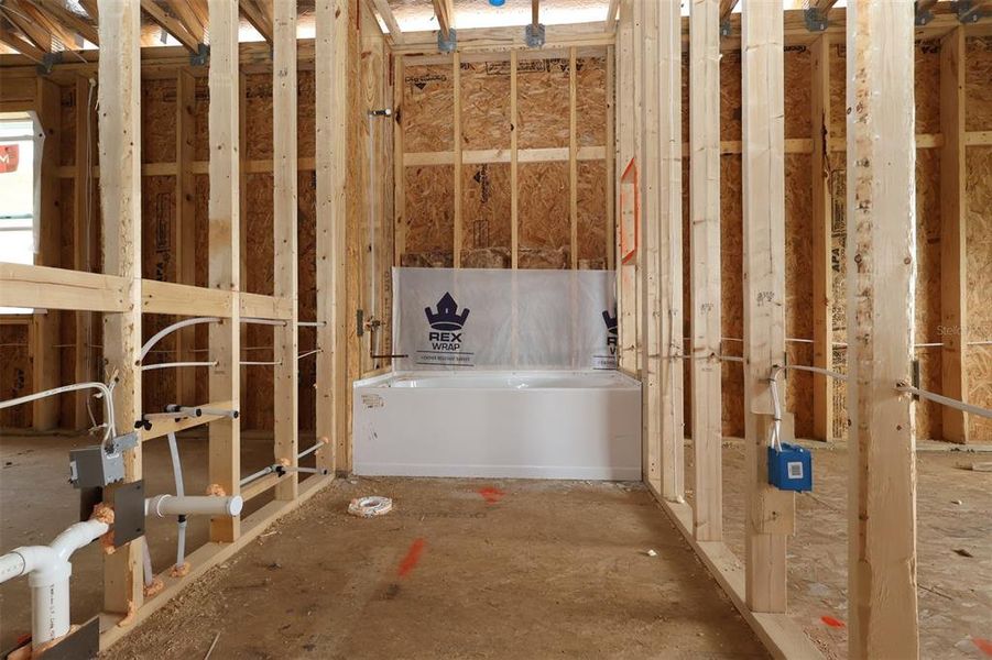 In-progress construction of a new home in Lake Star at Ovation, Winter Garden, FL (Image 15).