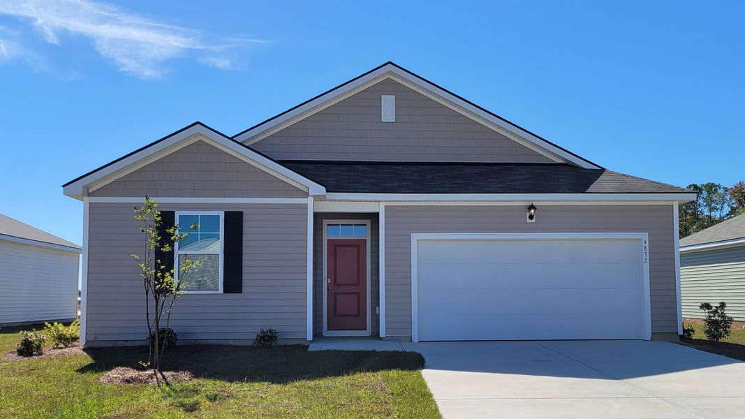 Front exterior of a new home in Summerville, Darlington, SC, highlighting curb appeal (Image 1). Front exterior of a new home in Summerville, Darlington, SC, highlighting curb appeal (Image 1).