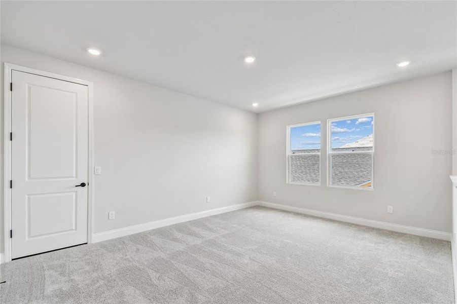 Spacious, unfurnished interior of a new home in Oakfield at Mount Dora Village Series, Mount Dora (Image 36).