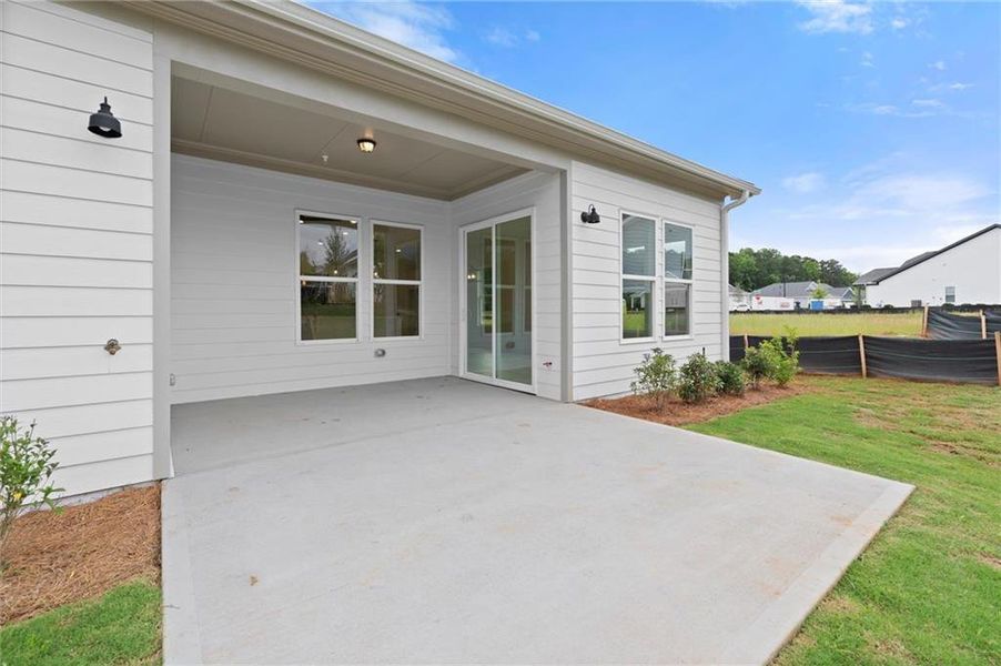 Exterior details and patio area of a home in The Reserve at Bells Ferry, Kennesaw (Image 29).