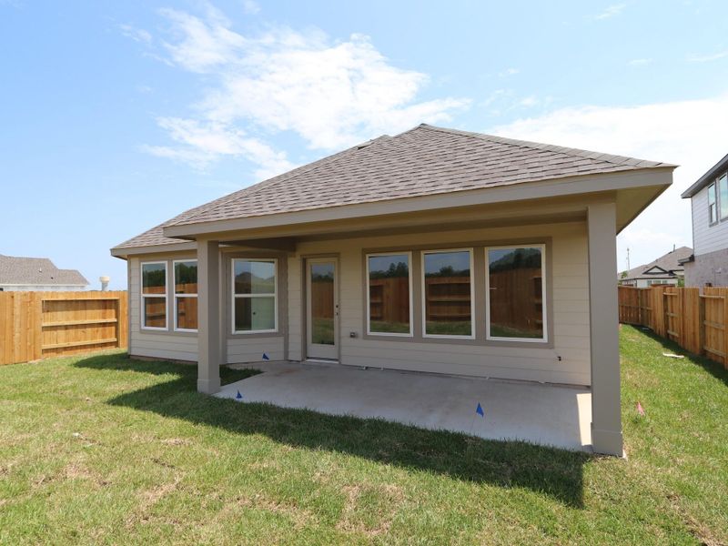 Front exterior of a new home in Lago Mar, Santa Fe, TX, highlighting curb appeal (Image 15). Front exterior of a new home in Lago Mar, Santa Fe, TX, highlighting curb appeal (Image 15).