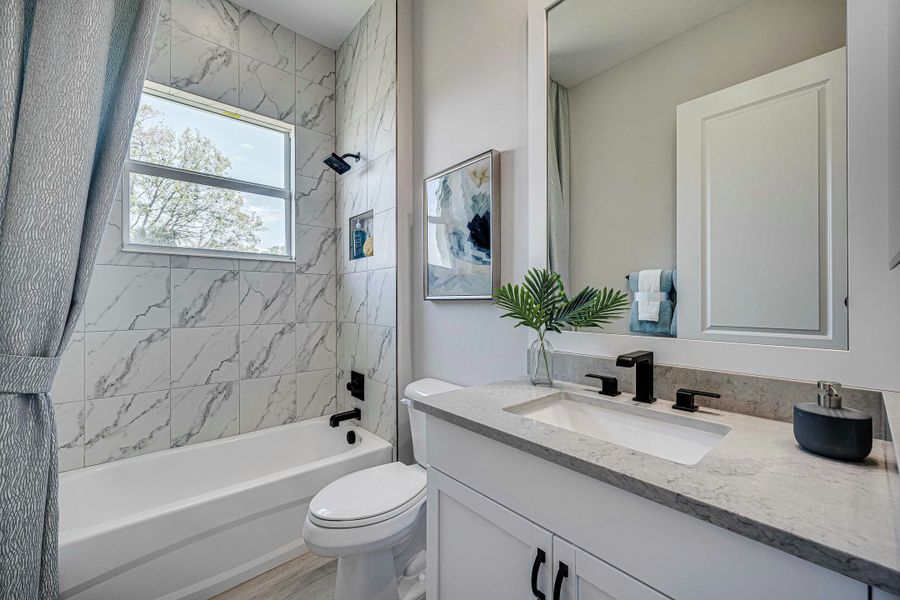 Furnished interior view inside a new home in Lucaya Pointe, Vero Beach (Image 12).