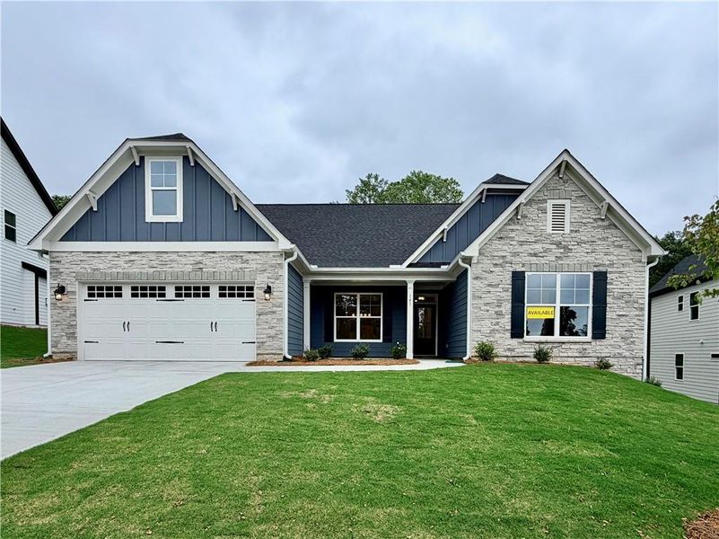 Front exterior of a new home in Arbor West, Dawsonville, GA, highlighting curb appeal (Image 1). Front exterior of a new home in Arbor West, Dawsonville, GA, highlighting curb appeal (Image 1).