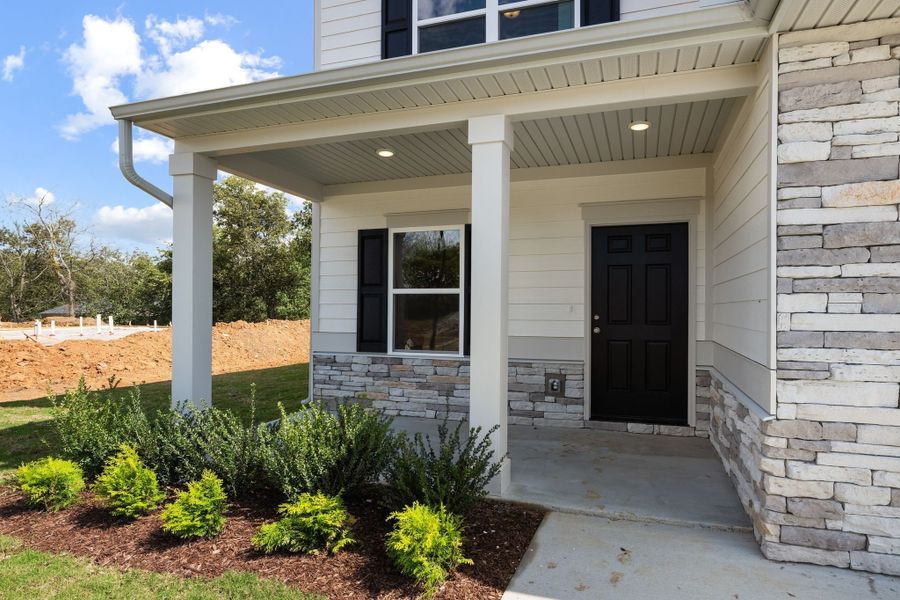 Large front covered patio.