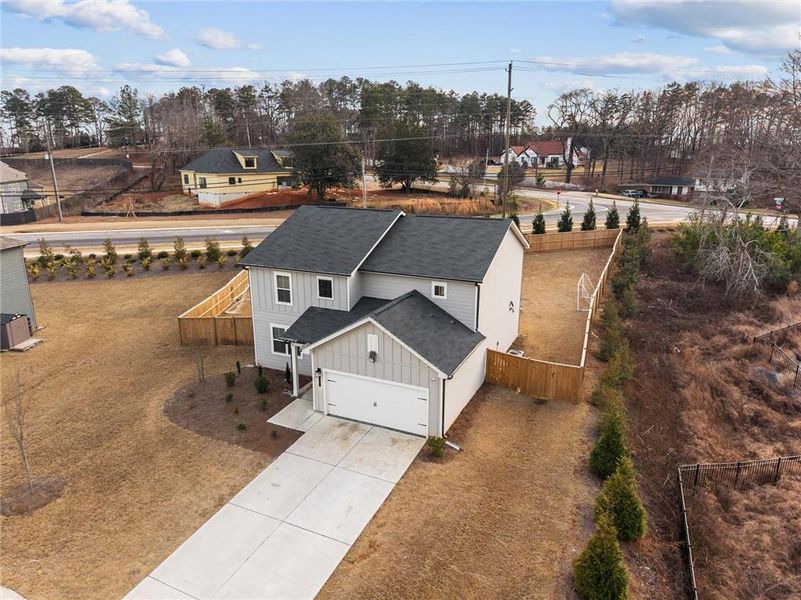 Front exterior of a new home in Alcovy Trace, Lawrenceville, GA, highlighting curb appeal (Image 22).