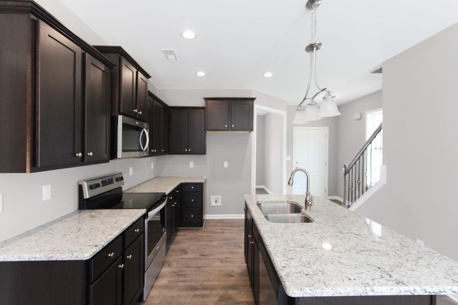 Representative furnished interior of a home built from the Furyk by RiverWILD Homes in Alton Fields, Coats (Image 13). Representative furnished interior of a home built from the Furyk by RiverWILD Homes in Alton Fields, Coats (Image 13).