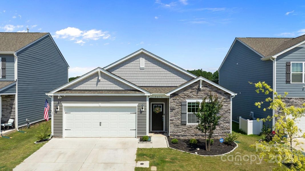Front exterior of a new home in Secrest Commons, Monroe, NC, highlighting curb appeal (Image 24).
