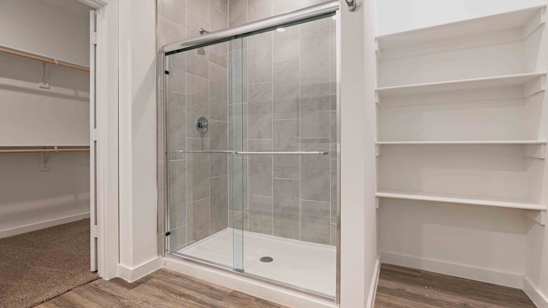 Representative furnished interior of a home built from the The Kendall by D.R. Horton in Overlook West, Wolfforth (Image 6).