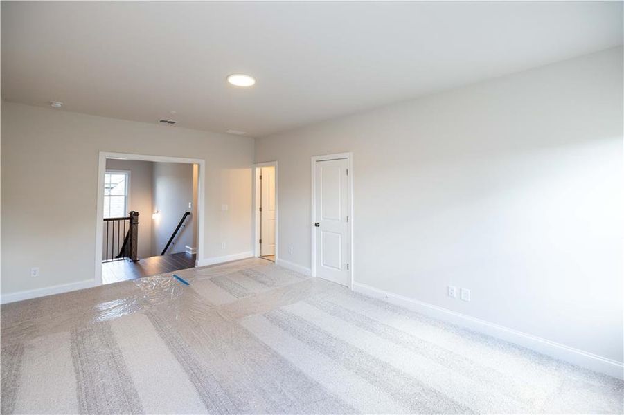 Spacious, unfurnished interior of a new home in Promenade at Sawnee Village, Cumming (Image 26).