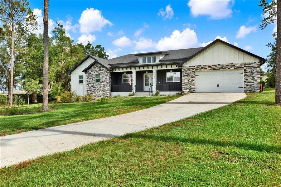 Front exterior of a new home in , Dade City, FL, highlighting curb appeal (Image 27). Front exterior of a new home in , Dade City, FL, highlighting curb appeal (Image 27).