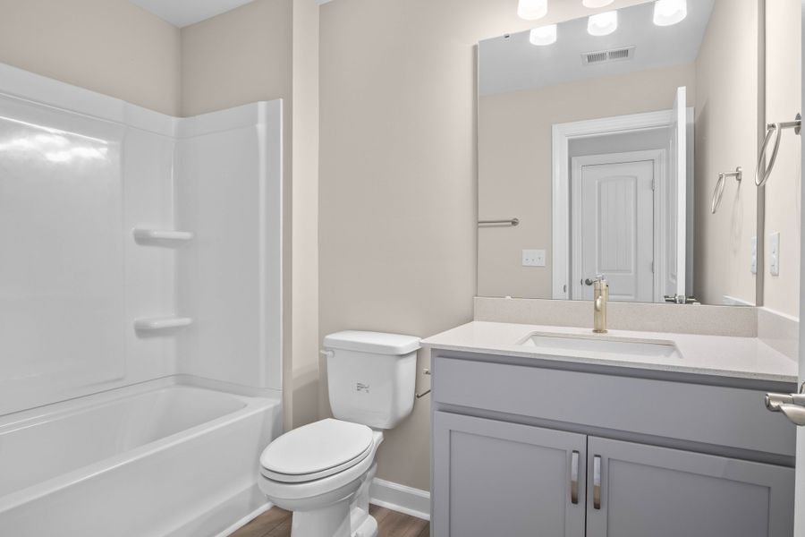 Furnished interior view inside a new home in Coastal Club of the Carolinas, Calabash (Image 8).