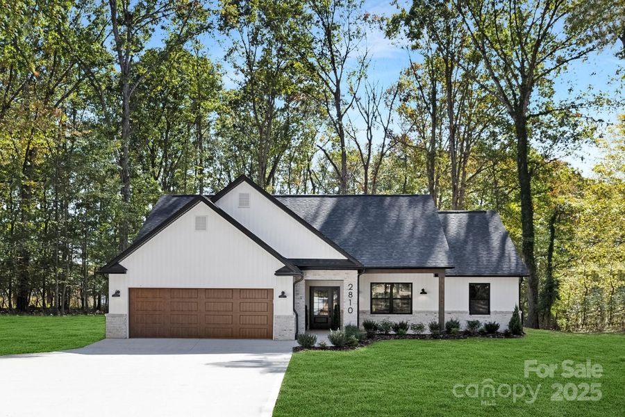 Front exterior of a new home in , Gastonia, NC, highlighting curb appeal (Image 24).