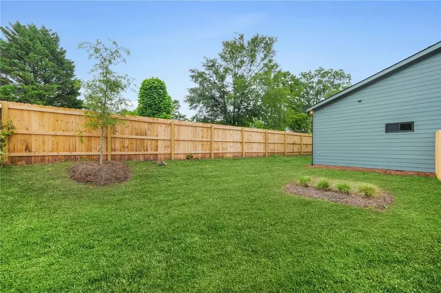 Exterior details and patio area of a home in , Atlanta (Image 3). Exterior details and patio area of a home in , Atlanta (Image 3).
