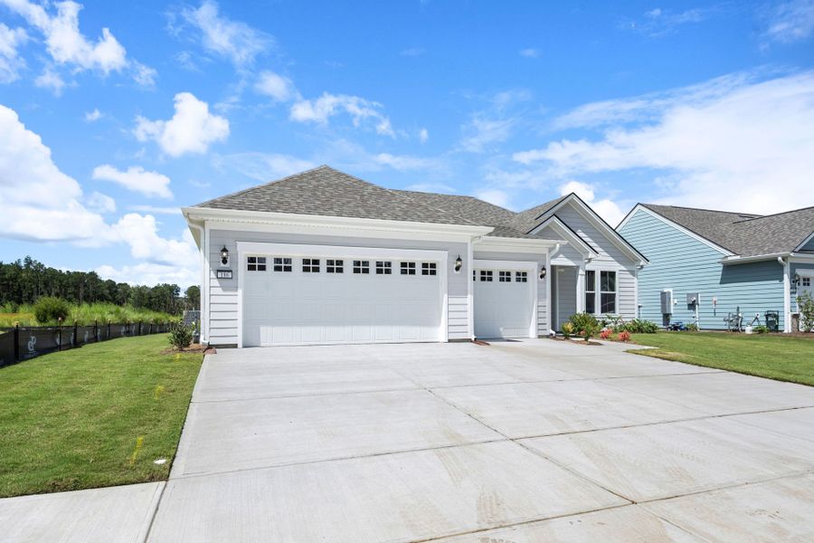Front exterior of a new home in Del Webb Savannah at Heartwood, Richmond Hill, GA, highlighting curb appeal (Image 26).