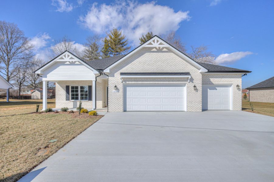 Front exterior of a new home in Fox Run, Manchester, TN, highlighting curb appeal (Image 1). Front exterior of a new home in Fox Run, Manchester, TN, highlighting curb appeal (Image 1).