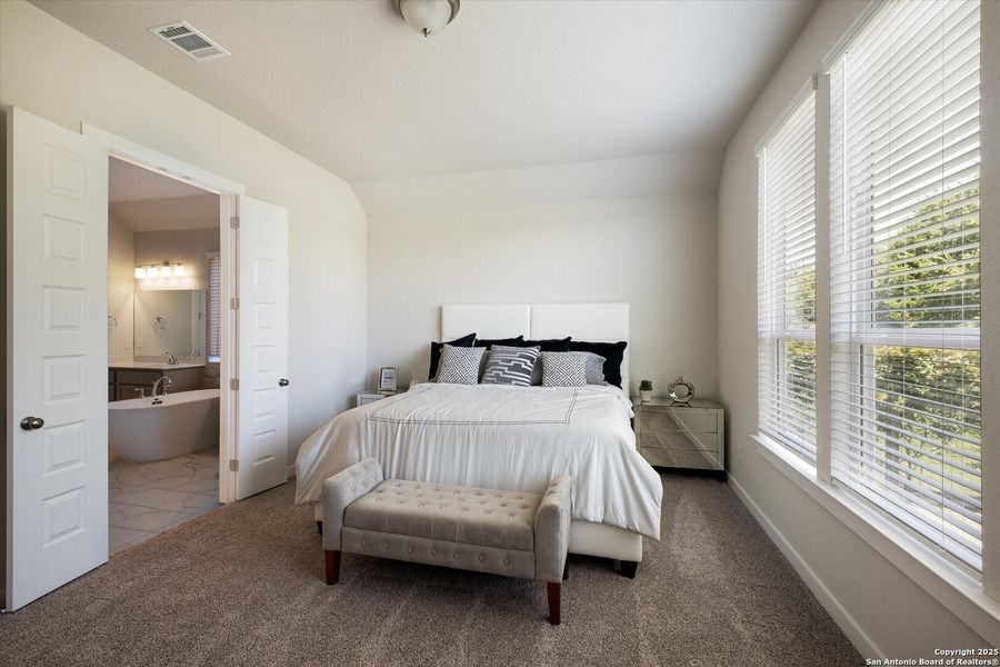 Furnished interior view inside a new home in The Crossvine, Schertz (Image 16).