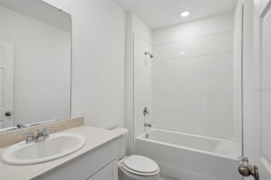 Furnished interior view inside a new home in Lake Deer Estates - Signature Series, Poinciana (Image 9). Furnished interior view inside a new home in Lake Deer Estates - Signature Series, Poinciana (Image 9).