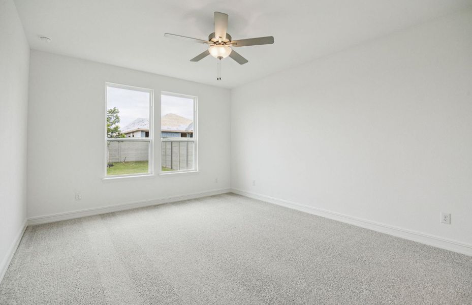 Elegant Owner's suite with beautiful finishes and ample floor space  *Real home pictured