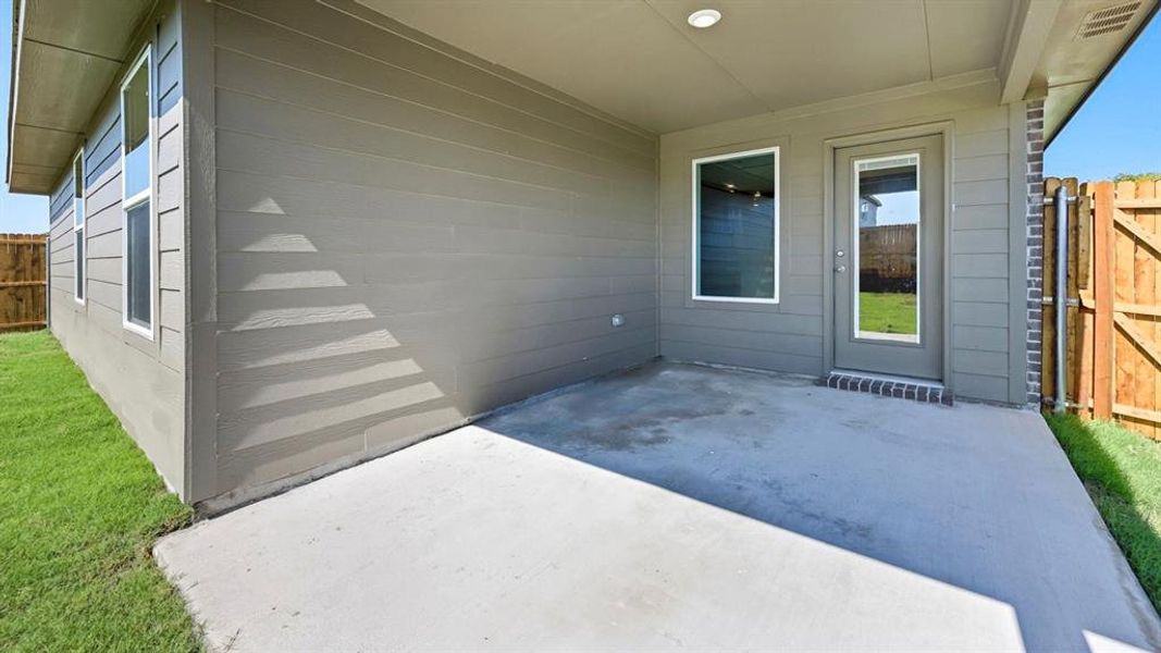 Exterior details and patio area of a home in Frontier Pointe, Princeton (Image 1). Exterior details and patio area of a home in Frontier Pointe, Princeton (Image 1).