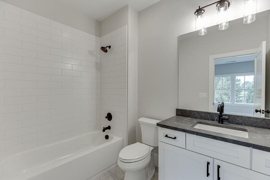 Furnished interior view inside a new home in , Cumming (Image 32).