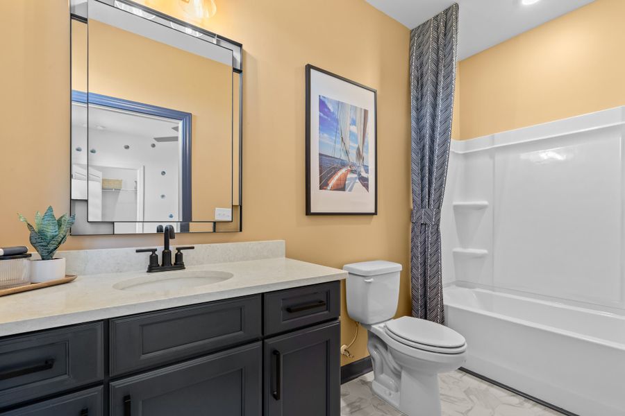 Representative furnished interior of a home built from the The Surfrider by Chesapeake Homes in Coastal Club of the Carolinas, Calabash (Image 58).
