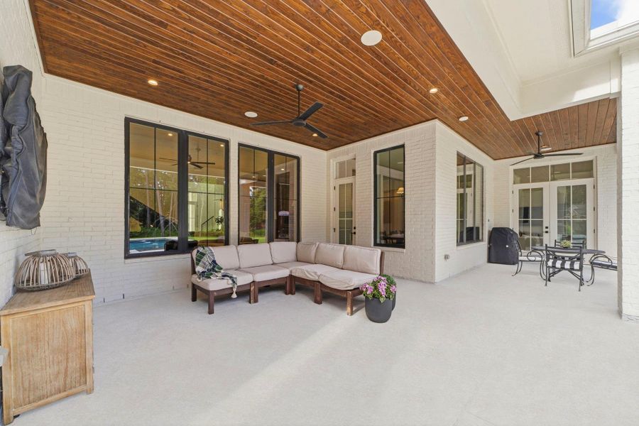 Beautiful ceiling treatment with ceiling fans, recessed lighting, and great covered space for lounging and dining. Beautiful ceiling treatment with ceiling fans, recessed lighting, and great covered space for lounging and dining.